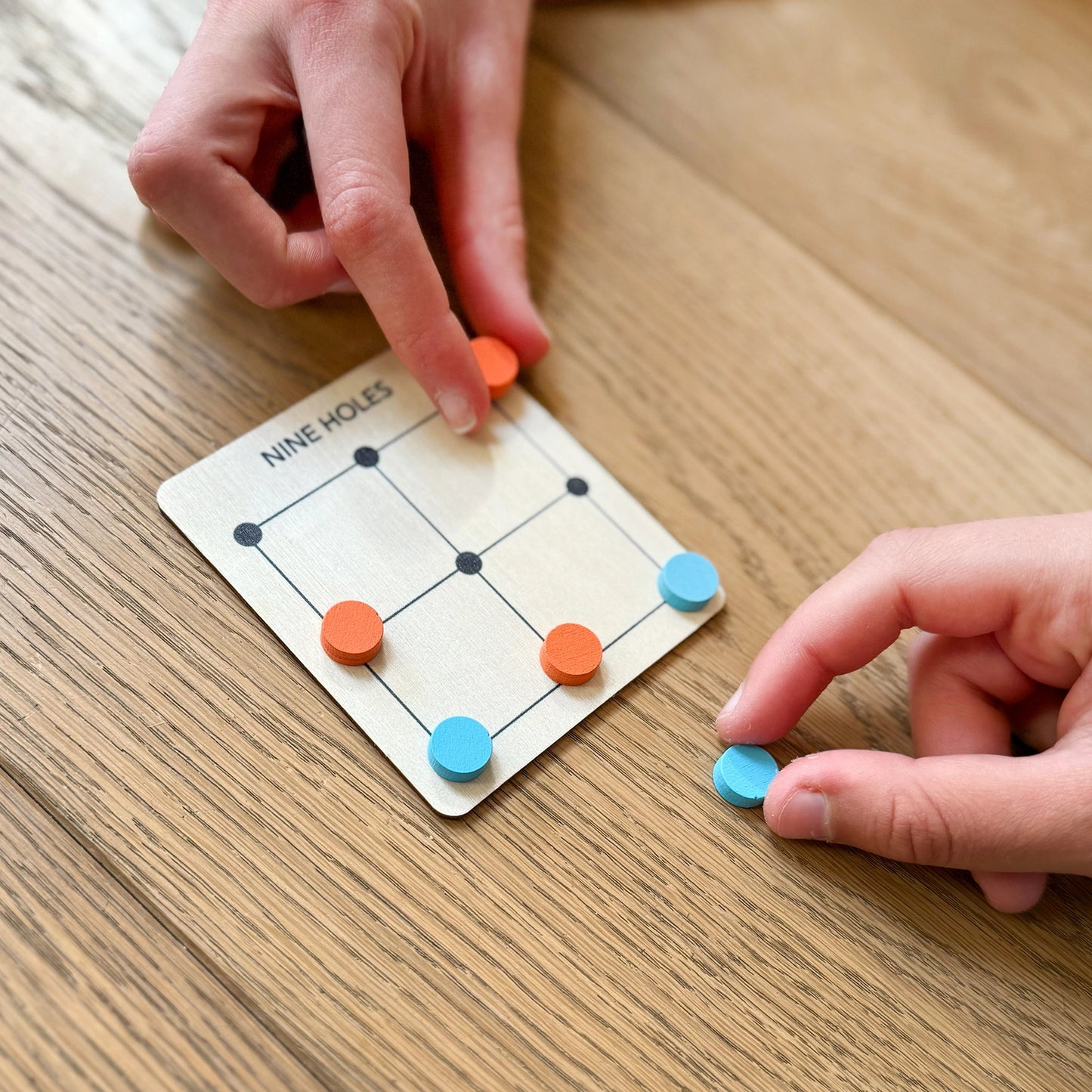 Spiel der Neun Löcher - Holzbrettspiel (in der Tüte)